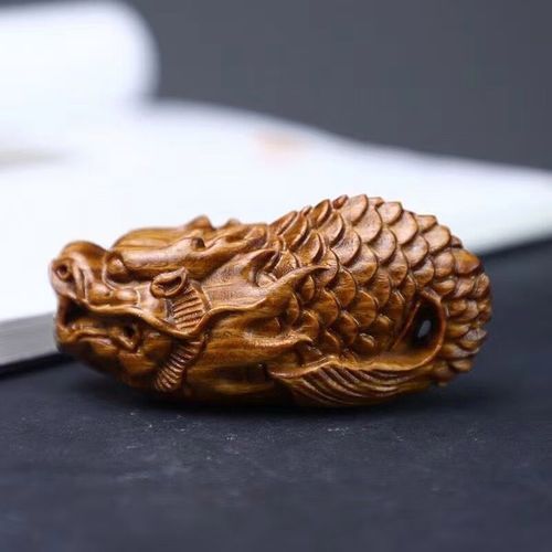 給我一些龍頭魚身掛件的圖片，龍頭魚身掛件的價格